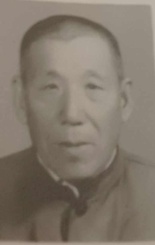 周明德