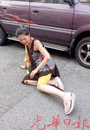 中国女游客大马遭抢劫受伤无人理