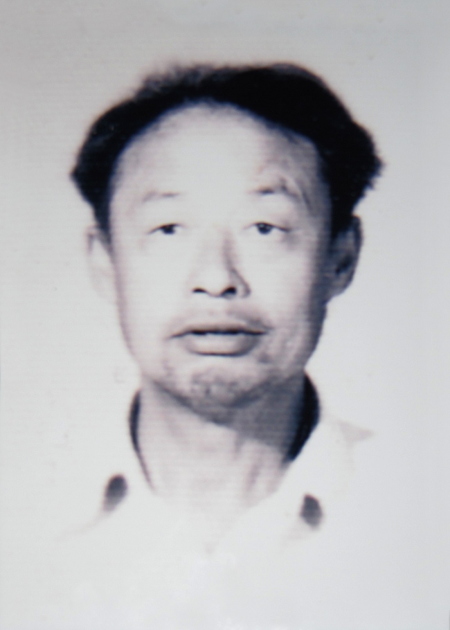慈父隋忠田